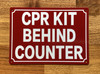 cpr-kit-behind-counter-sign-screw-mount-identification.jpg
