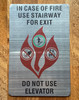 in-case-of-fire-use-stairway-for-exit-aluminum-sign-peel-and-stick.jpg