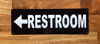 restroom-left-arrow-4x12-building-signage.jpg