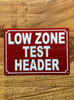 low-zone-test-header-red-safety-sign.jpg