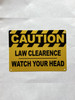 5x7-caution-law-clearence-watch-your-head-orange-metal-identification-sign.jpg