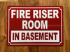 red-fire-riser-room-in-basement-screw-mount-sign.jpg