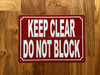 5x7-keep-clear-do-not-block-metal-identification-sign.jpg