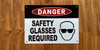 white-danger-safety-glasses-requi-screw-mount-sign.jpg
