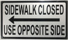 BUILDING SIGN  Sidewalk Closed   USE OPPOSITE SIDE  left ARROW