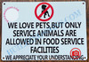 WE LOVE PETS BUT ONLY SERVICE ANIMALS ARE ALLOWED IN FOOD SERVICE FACILITIES SIGN