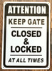 Sign ATTENTION KEEP GATE CLOSED AND LOCK AT ALL TIME