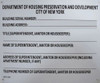 Building Registration number sign  code 27-2104   white
