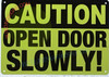 CAUTION: OPEN DOOR SLOWLY SIGN