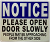 Please open door slowly Signage