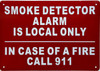 Sign SMOKE DETECTOR ALARM IS LOCAL ONLY IN CASE OF FIRE CALL 911