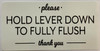 Sign PLEASE HOLD LEVER DOWN TO FULLY FLUSH STICKER