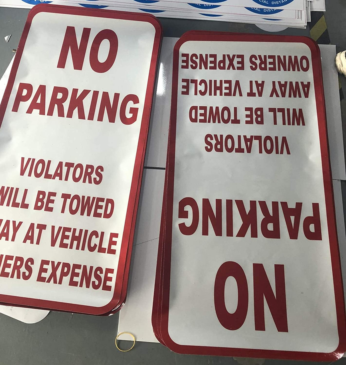 NO PARKING VIOLATORS WILL BE TOWED AWAY AT VEHICLE OWNERS