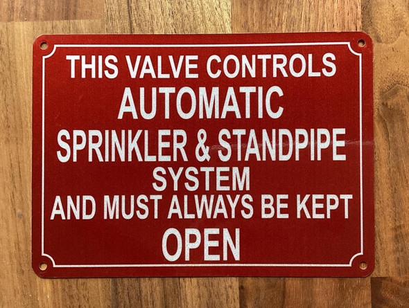 NYC THIS VALVE CONTROLS AUTOMATIC SPRINKLER AND STANDPIPE SYSTEM AND MUST ALWAYS BE KEPT OPEN SIGN