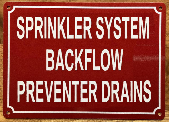 SPRINKLER SYSTEM BACKFLOW PREVENTER DRAINS SIGN