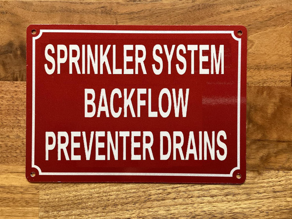 NYC SPRINKLER SYSTEM BACKFLOW PREVENTER DRAINS SIGN