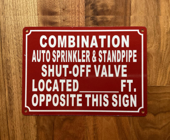 NYC COMBINATION AUTO SPRINKLER AND STANDPIPE SHUT OFF VALVE LOCATED FT OPPOSITE THIS SIGN SIGN