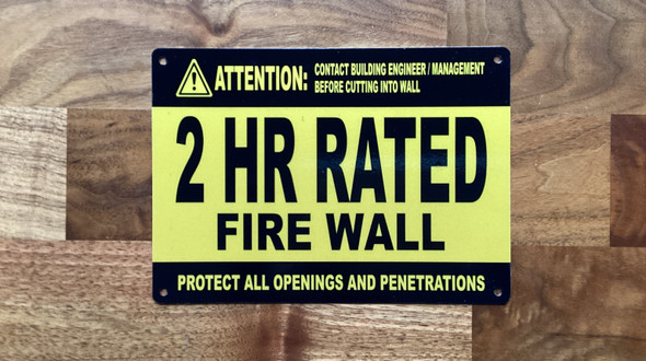 attention-2-hour-rated-fire-wall-mounting-holes-equipment-label.jpg