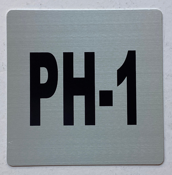 Apartment number PH-1 sign