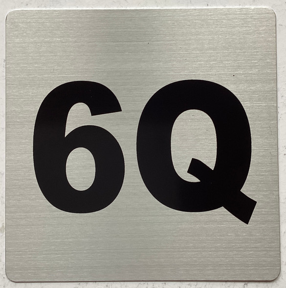 Apartment number 6Q sign