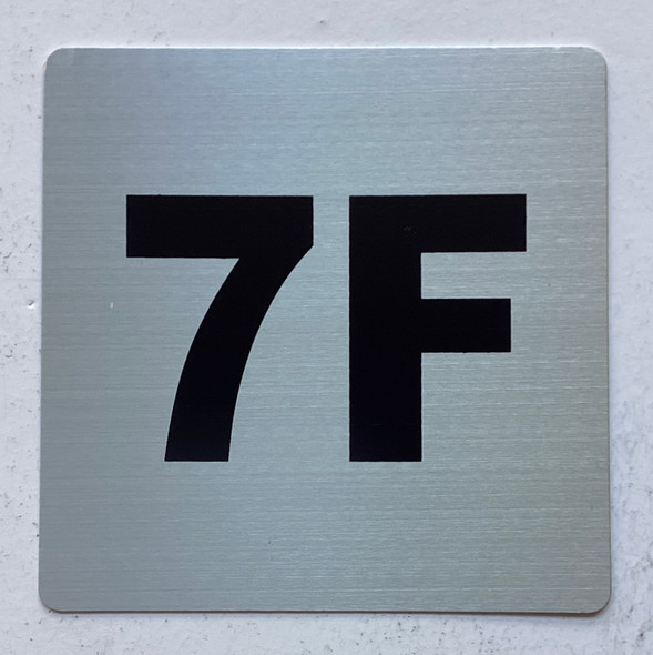 Apartment number 7F sign