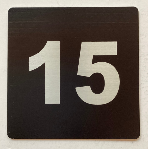 Apartment number 15 sign