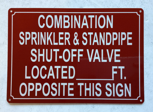 COMBINATION SPRINKLER AND STANDPIPE SHUT OFF VALVE LOCATED FEET OPPOSITE THIS SIGN