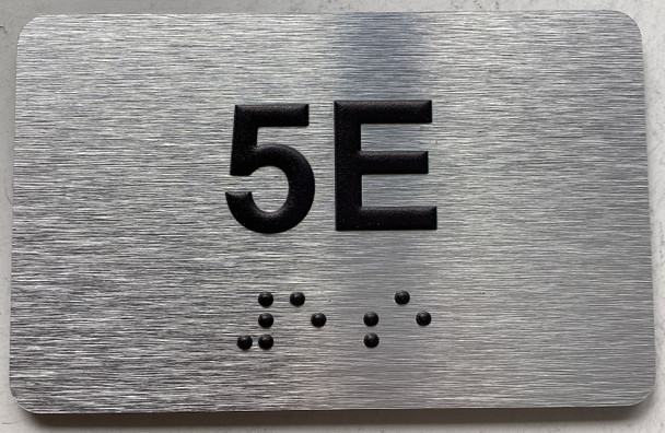 APT# 5E SILVER Sign