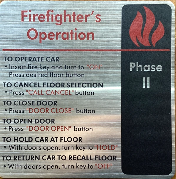 elevator-emergency-firefighters-operation-phase-1-6-x-6-silver-aluminum-sign.jpg