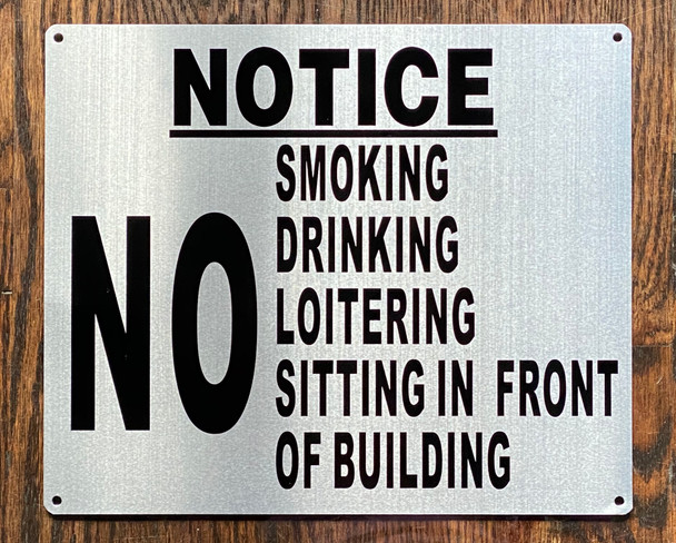 NO SMOKING DRINKING LOITERING SITTING IN FRONT OF BUILDING SIGN