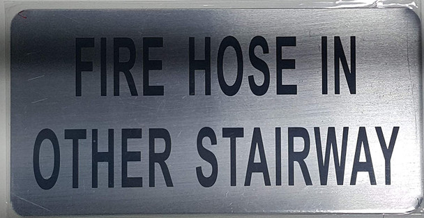 Sign FIRE Hose in Other Stairway