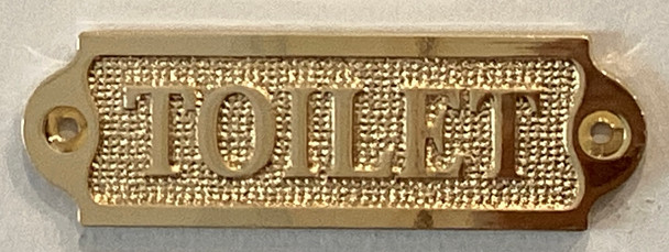 Toilet brass sign