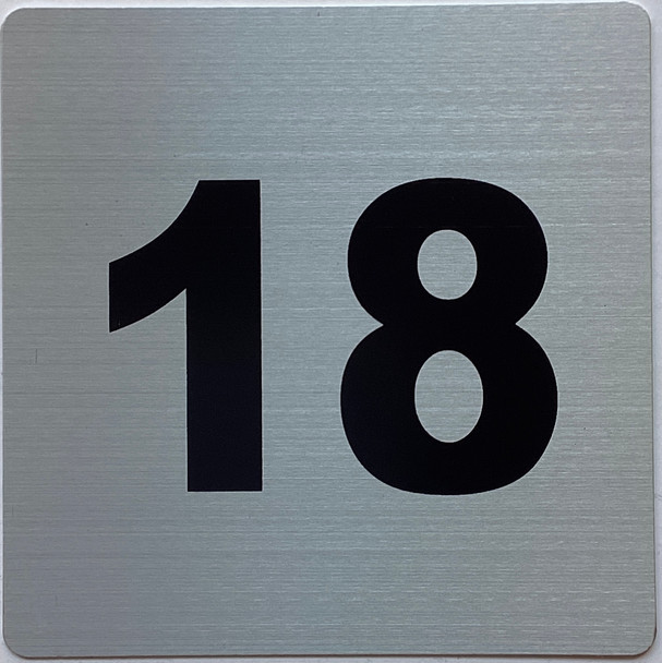 Apartment number 18 sign