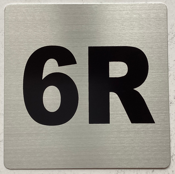 Apartment number 6R sign