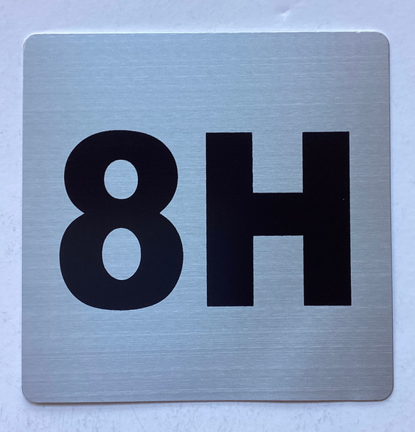 Apartment number 8H sign