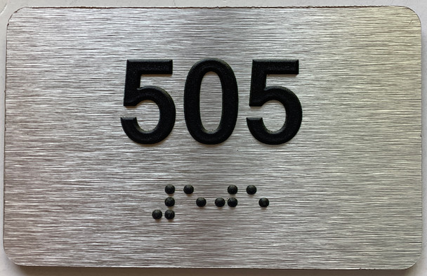 apartment number 505 sign