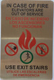 IN CASE OF FIRE ELEVATORS ARE OUT OF SERVICE USE EXIT STAIRS SAFETY SIGN