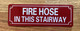 HPD FIRE HOSE IN THIS STAIRWAY SIGN