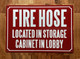 FIRE HOSE LOCATED IN STORAGE CABINET IN LOBBY SAFETY SIGN