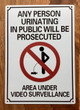 FD ANY PERSON URINATING IN PUBLIC WILL BE PROSECUTED -NO PUBLIC URINATION SIGN