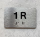 FD APT NUMBER 1R SIGN-UNIT NUMBER SIGN WITH RAISED LETTERS
