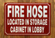 FIRE HOSE LOCATED IN STORAGE CABINET IN LOBBY SAFETY SIGN