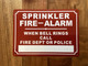 SPRINKLER FIRE ALARM WHEN BELL RING CALL FIRE DEPT OR POLICE COMPLIANCE SIGN