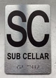 FLOOR SC SUB CELLAR Braille Sign