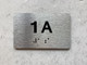 APT# 1A SILVER Compliance Sign