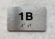 APT# 1B SILVER Braille Sign