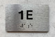 APT# 1E SILVER Ada Sign