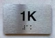 APT# 1K SILVER Ada Sign
