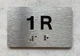 APT# 1R SILVER Ada Sign