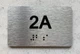 APT# 2A SILVER Braille Sign